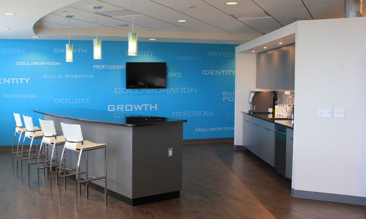 View towards coffee bar lounge from open plan working space. Photo by Tim Hannaway.