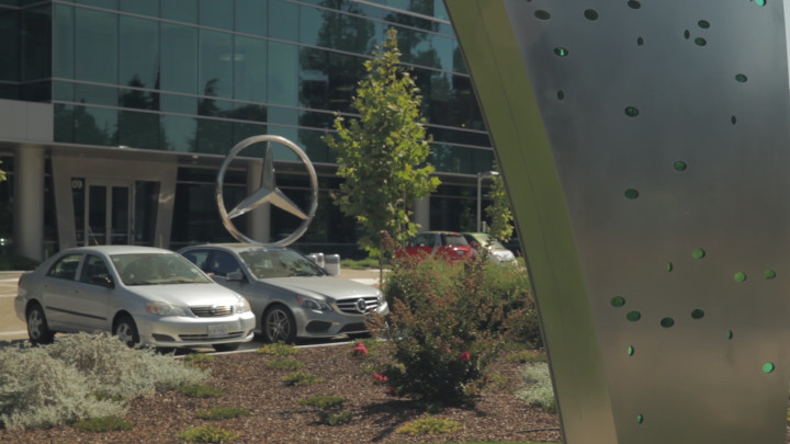 A shining, spinning Mercedes star holds court at the entrance of MBRDNA's new Silicon Valley HQ. All images are stills from video footage, courtesy of videographer Jason Cheung.