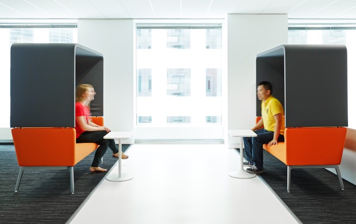 At the Toronto branch of IPG Mediabrands, the lounge pods pictured face one another to encourage impromptu conversations, people watching and the opportunity to drop in and hang out in a social space — all reasons to go into the office. Photo by Steve Tsai Photography.