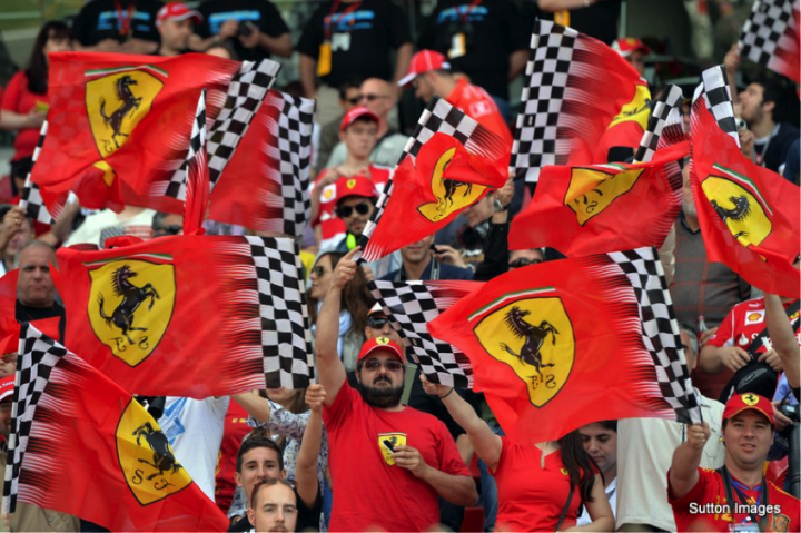 At Formula One events, devoted crowds of “Tifosi” are inspired by the Ferrari brand of innovation and excitement. Photo via Sutton Images.