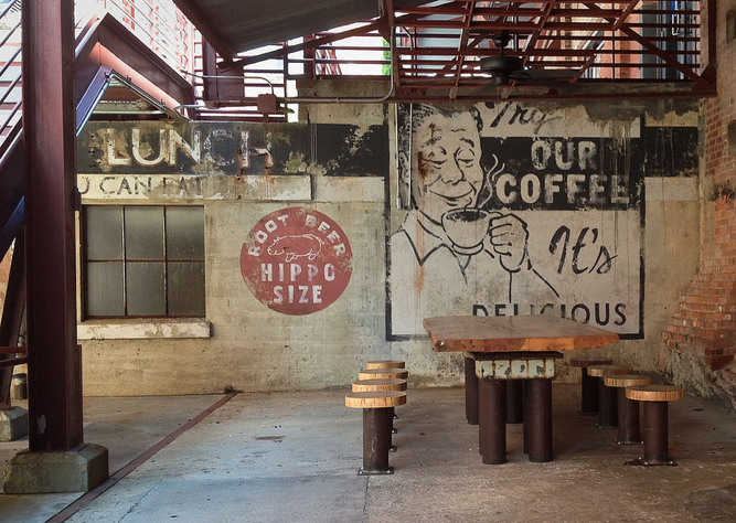 An outdoor cafe at the American Tobacco Campus in Raleigh. Image via American Tobacco's Flickr account.