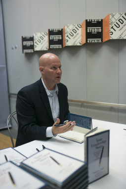 Tobin signed copies of his books for attendees. Photo by Yura Liamin.