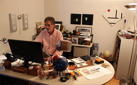 Today, the author's office is a veritable shrine to workplace play and creativity. Everything in his office has a story. See the white canvas on the wall? That's his first painting. And the single-engine yellow plane hanging overhead? It's a 1/3-scale model of one he used to fly. Image courtesy of Baskervill.