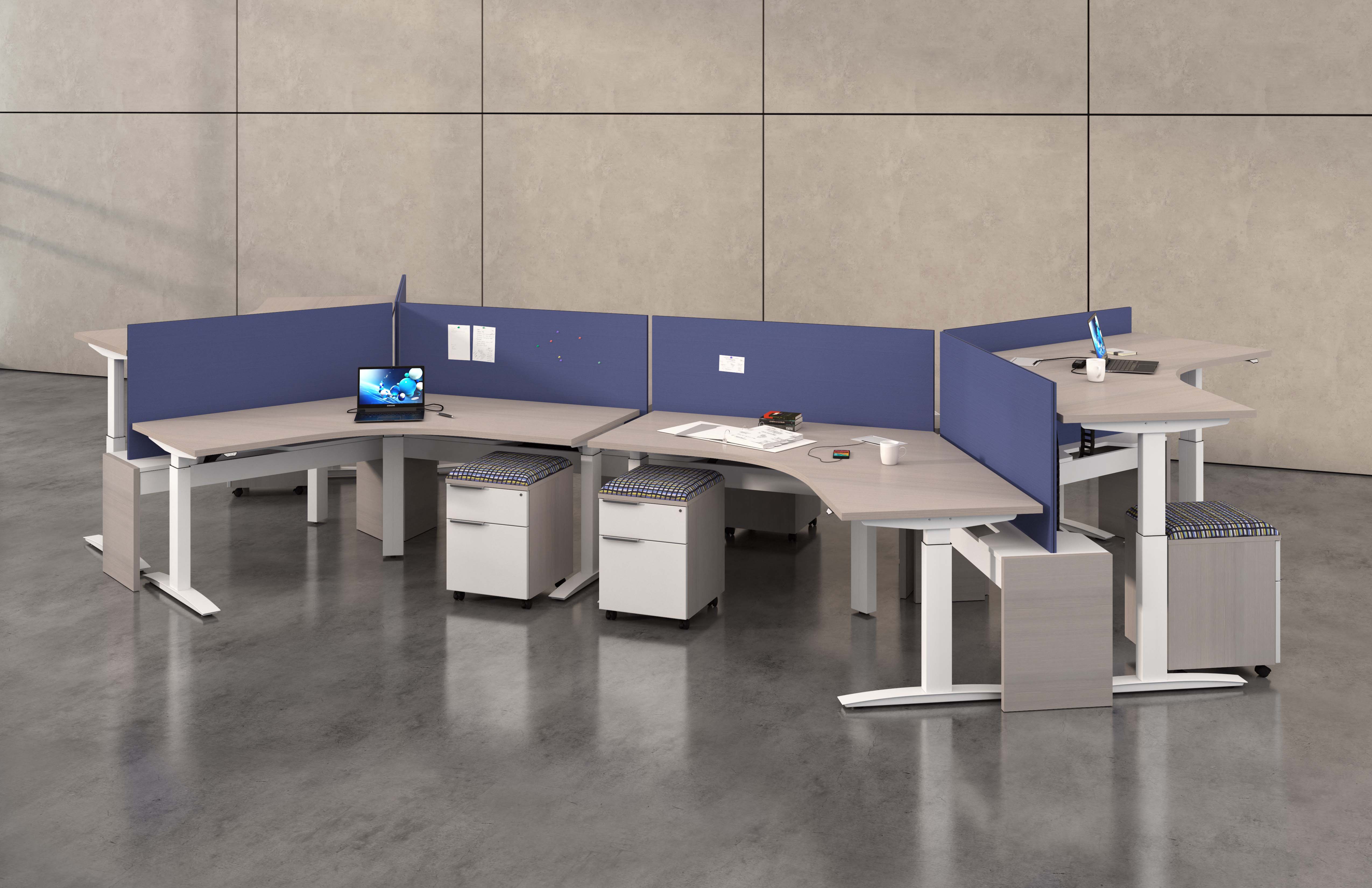 Hover adjustable-height worksurfaces can be integrated into all of DeskMakers casegoods lines, our TeamWorx desking line, and stand-alone workstations. Hover benching also provides power distribution and cable management for adjustable-height benching environments. Image courtesy of DeskMakers.