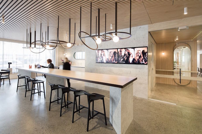 L'Oreal's new training academy attracts millennials with its warm and welcoming--yet still chic--space. Image courtesy of Daniel Shipp. 