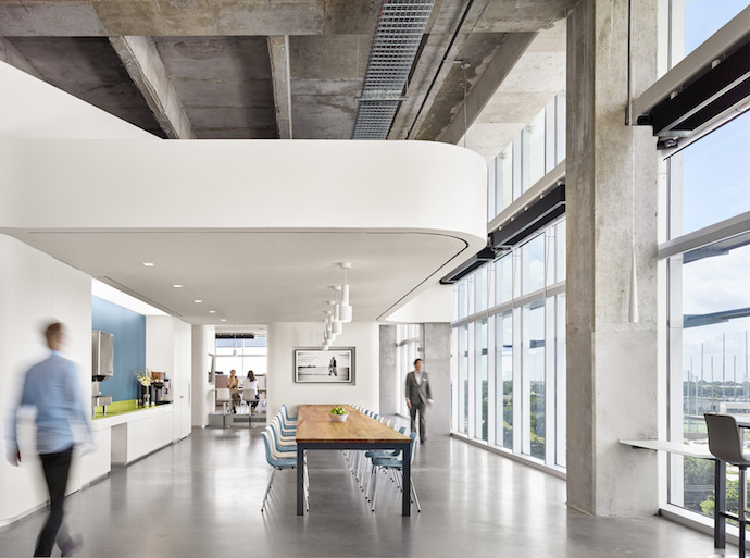 Elevated sections of floor provide all employees, not just those at the window line, with access to natural light and views. Image courtesy of Casey Dunn Photography.