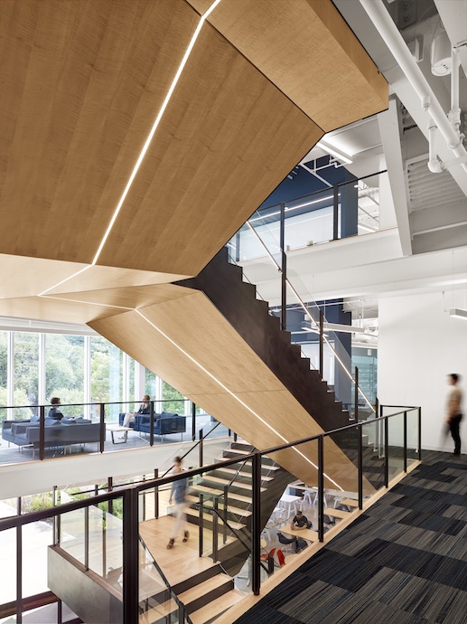 The stair, which connects all three floors, is central to Trend Micro's new offices. Image courtesy of Casey Dunn.