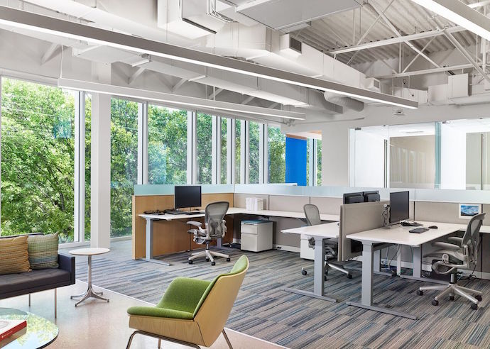 Workstations feature sit-stand desks. Image courtesy of Casey Dunn.