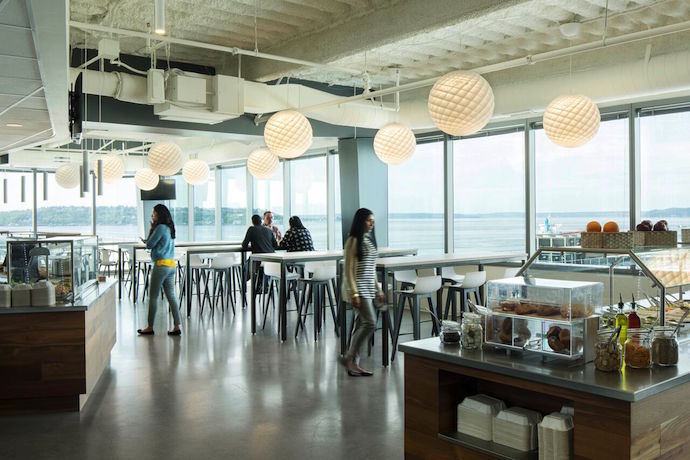 The cafe, located at the top of the building, affords a prime view of Elliott Bay—where company ships regularly put into port—a place where all staff are able to enjoy the best seat in the house. Image courtesy of Jeremy Bittermann.