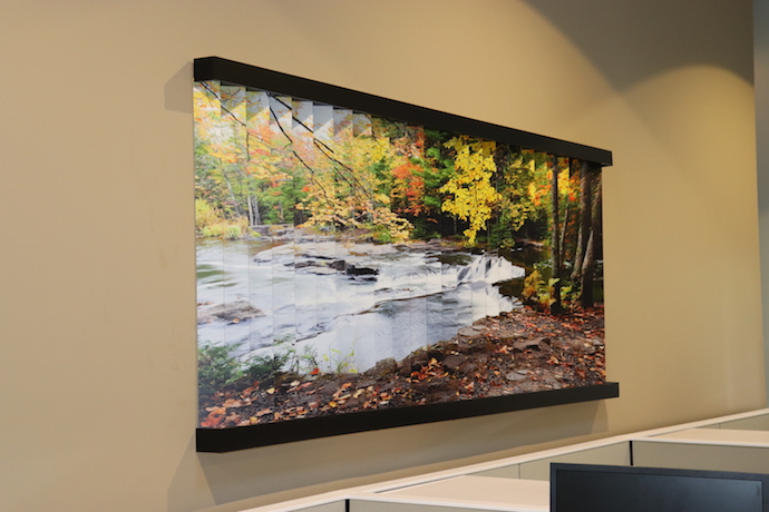 This accordion-style lenticular print sits above staff desks. Image courtesy of Cheryl Clowes.