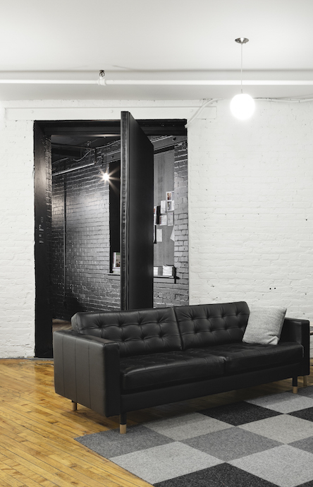 One of the most unique elements of Parka's new office is this swinging door. Image courtesy of Jessy Bernier Photographe. 